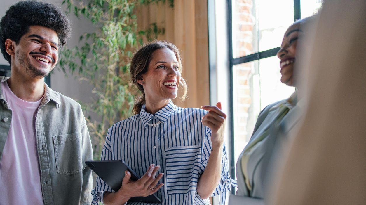 Diverse Team Engaging in Creative Brainstorming in Modern Office