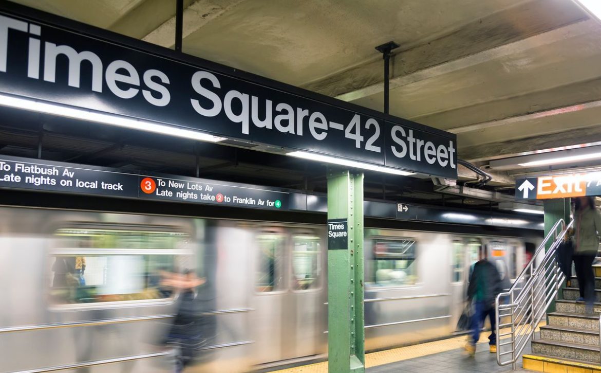 Commuters at Times Square Subway Station in New York City