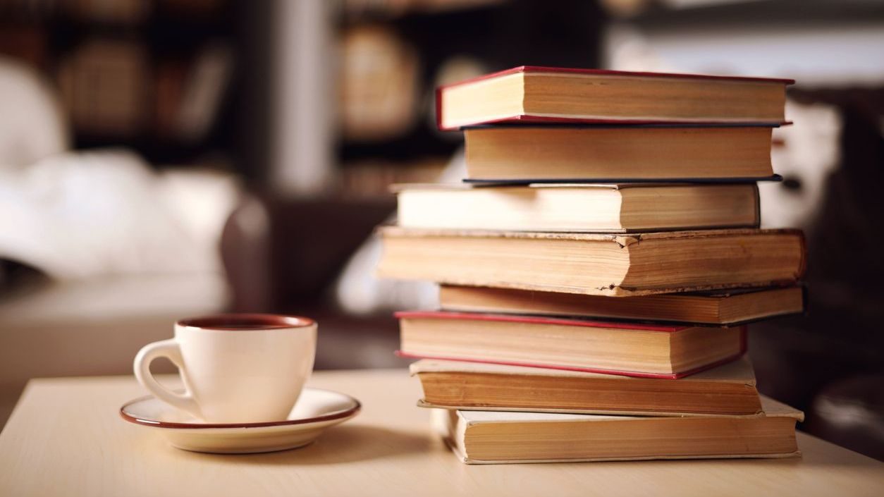 stack of books in home interior